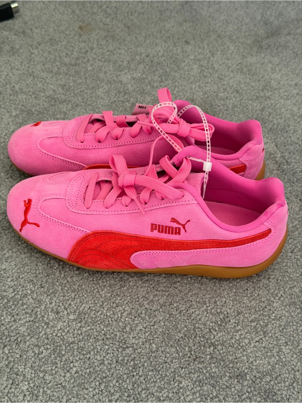Puma Speedcat OG sneakers in pink and red
SIZE: 6.5